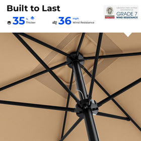 HOMSHADE beige outdoor umbrella creates inviting shade in the garden.
