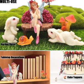 HONEYSHOW rabbit figurine pair brightens outdoor displays and pot arrangements.