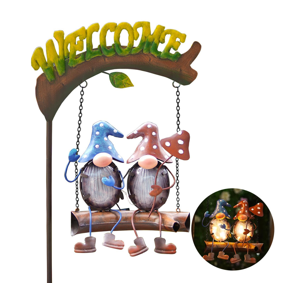 HONGLAND gnomes swing with welcome sign lighting the garden at night.
