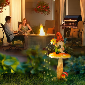 HONGLAND mushroom gnome brightens flower beds with subtle glow.