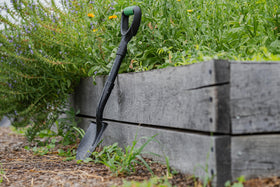 Hooyman mini digging shovel D-handle offers added leverage for heavy digs.