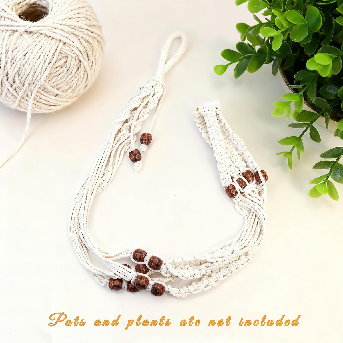 HOREAKHJ decorative plant hanger elevates balcony or patio accents.