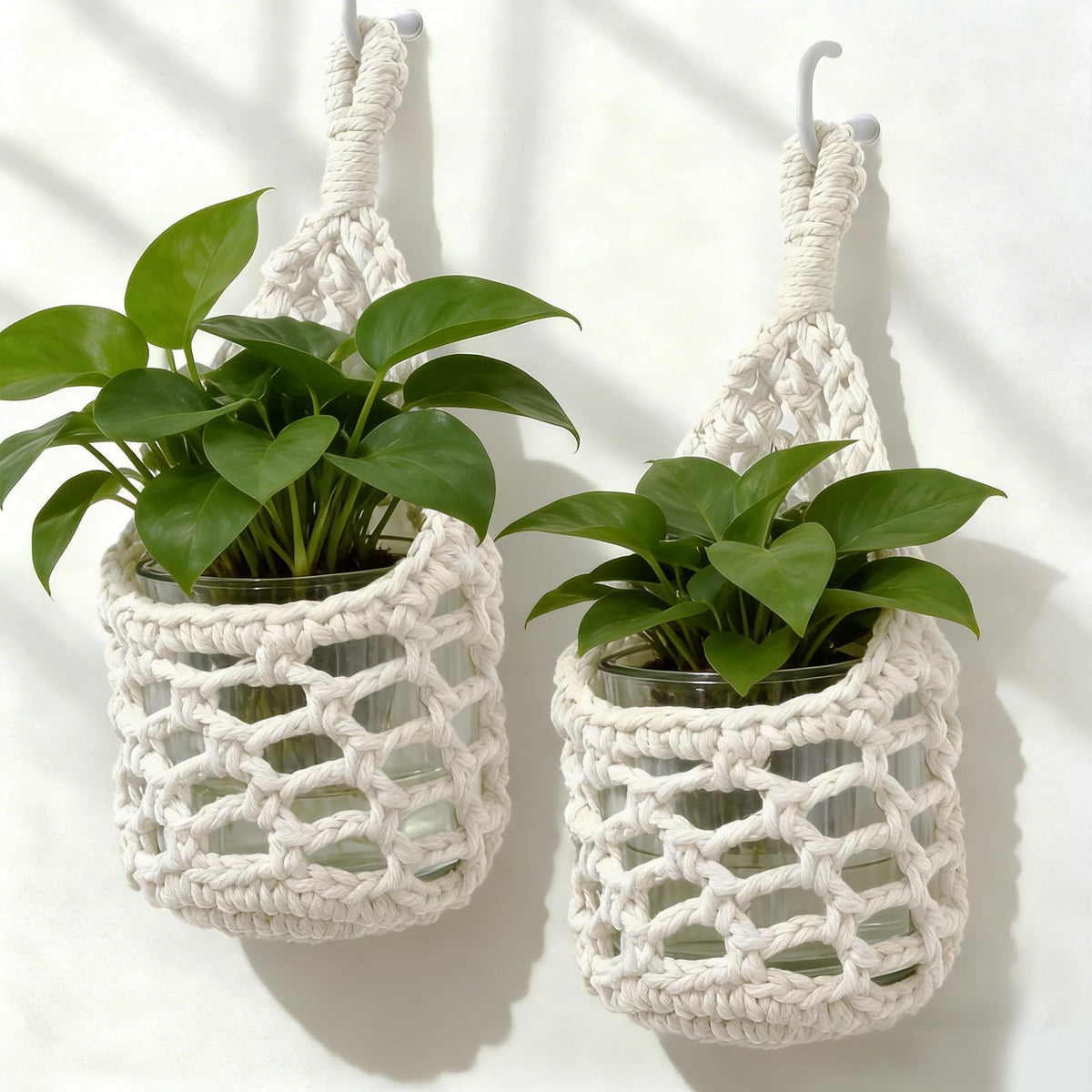 HOREAKHJ macrame wall hanger in ivory holding a 4-inch pot for stylish interiors