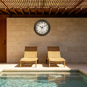 Horizent thermometer display on clock face for quick outdoor temperature checks.