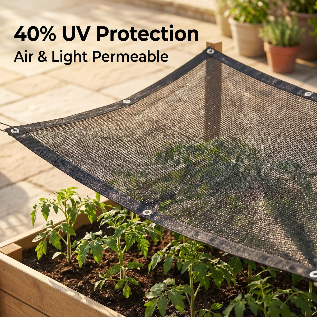 Greenhouse setup with Hortifan shade cloth protecting plants while keeping airflow
