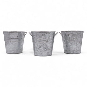 Hosley galvanized planters set of 3 on tabletop with liners for indoor display.