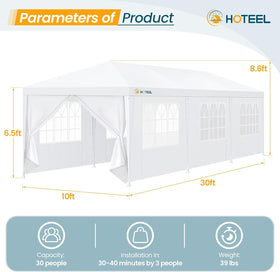 Hoteel backyard wedding ambiance with tent set up against a garden backdrop.