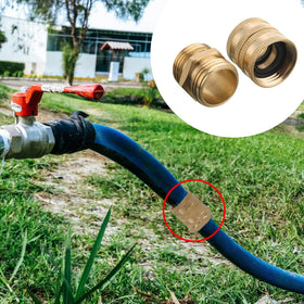 Hourleey brass hose adapter in use with garden hose outdoors.