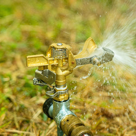 Hourleey sprinkler demonstrating full 360-degree pattern for large yards