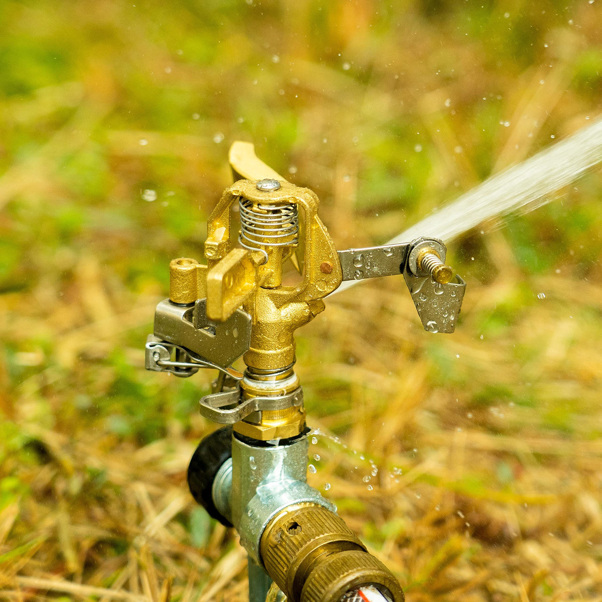 Hourleey sprinkler installed in a garden lawn setup for efficient irrigation