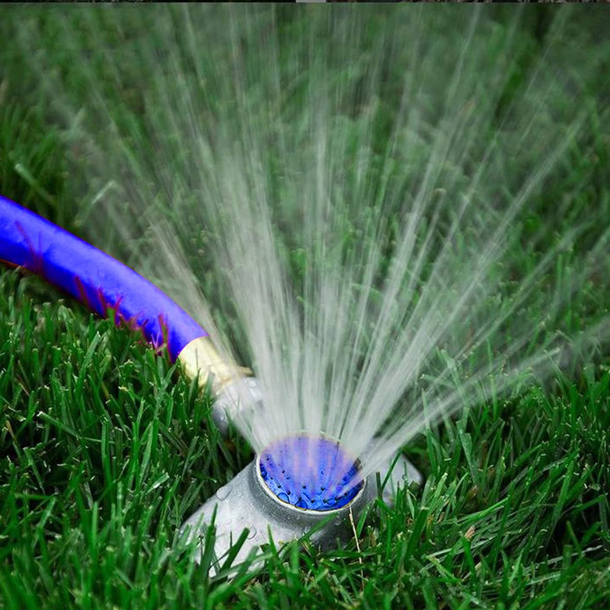 Hourleey blue sprinkler in garden, suitable for lawn and flower bed irrigation.