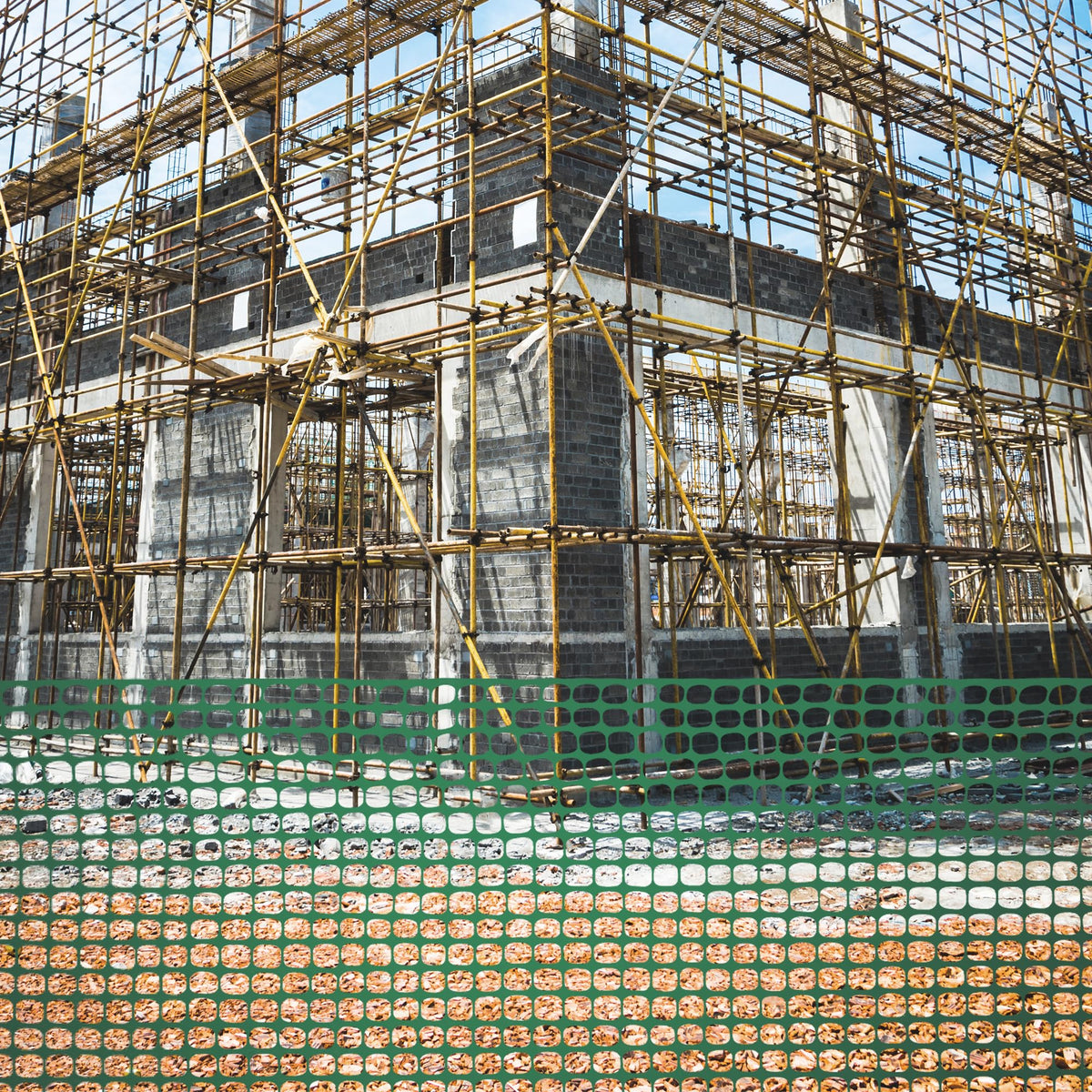 Houseables fencing serves as lightweight construction barrier around a site.