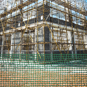Houseables fencing serves as lightweight construction barrier around a site.