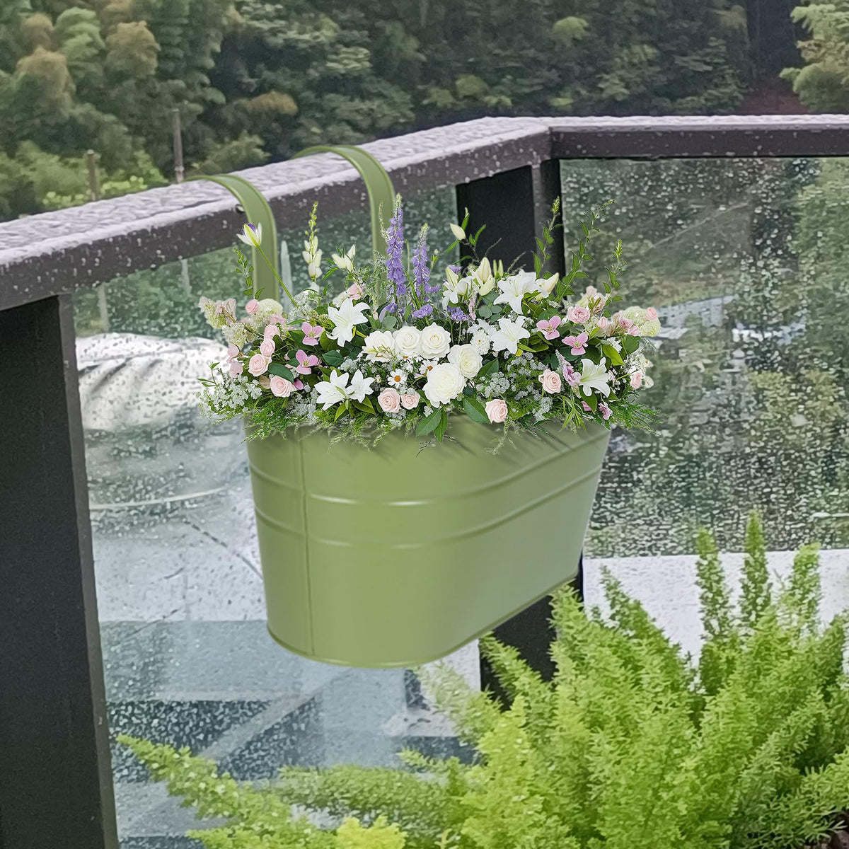 HowRU green metal planters add decorative garden accents.