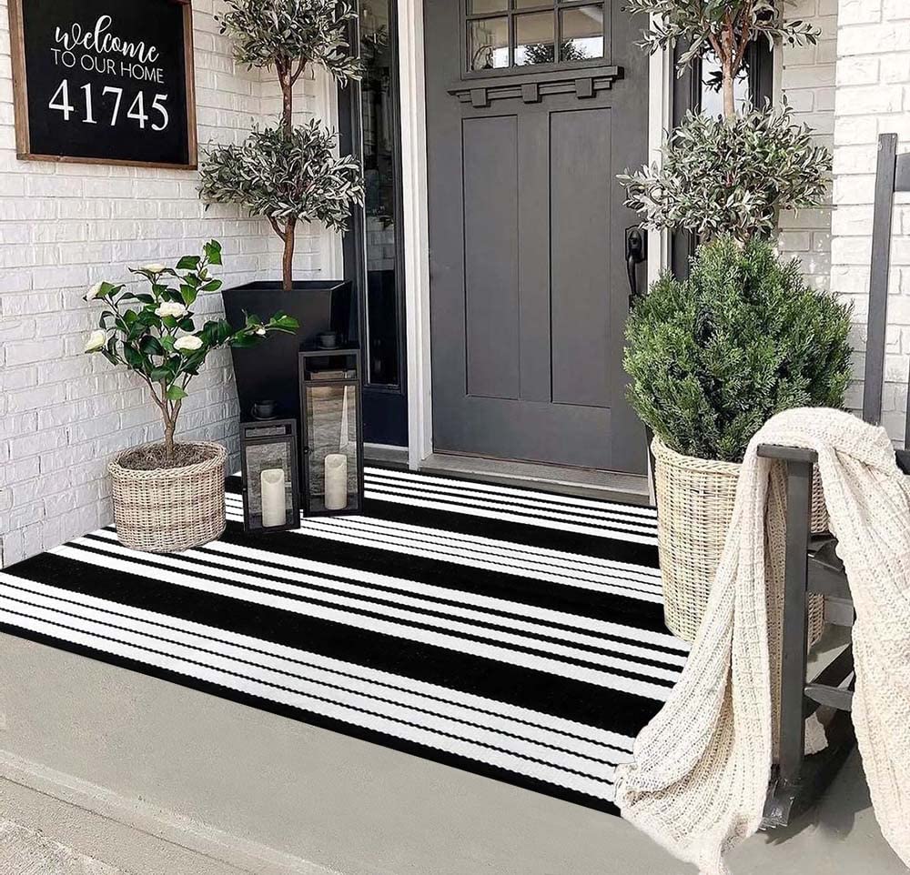 HOXCIK black and white outdoor rug with striped design for porch protection and style