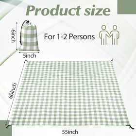 HunnmingRe waterproof picnic blanket spread on sand, ready for beach time.