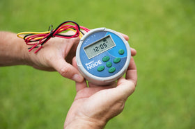 Hunter NODE-200 IP68 enclosure protects wiring in valve boxes during rain and dust.