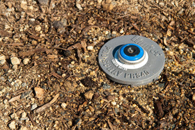 Hunter PRS40 pop-up sprinkler body during installation for easy DIY setup