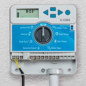 Hunter X-Core XC400i 4-zone irrigation setup image highlights independent scheduling.