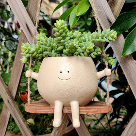 Hunthawk swing face planter indoor decor creates whimsy on desks and shelves.