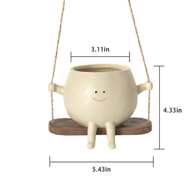 Hunthawk swing face planter outdoor display adds color to patios while standing up to sun and rain.