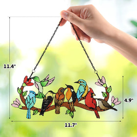 Huray Rayho suncatcher highlighting hummingbird details with bright color glow.