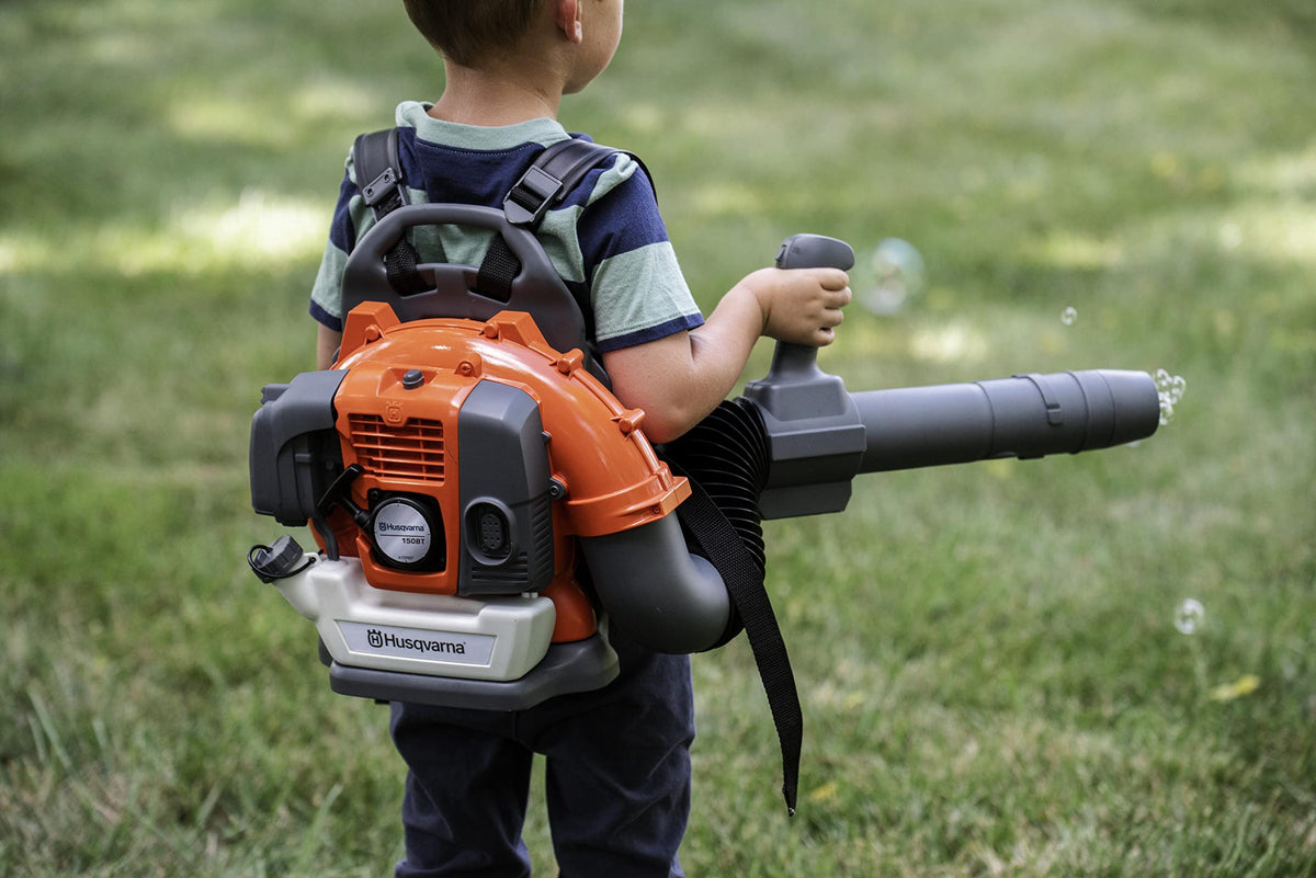 Husqvarna toy leaf blower includes bubble play for extra fun during pretend chores.