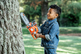 Husqvarna 550XP toy chainsaw suitable for ages 3 and up for safe fun.
