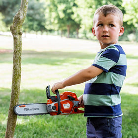 Husqvarna 550XP toy chainsaw requires 3 AA batteries (not included).