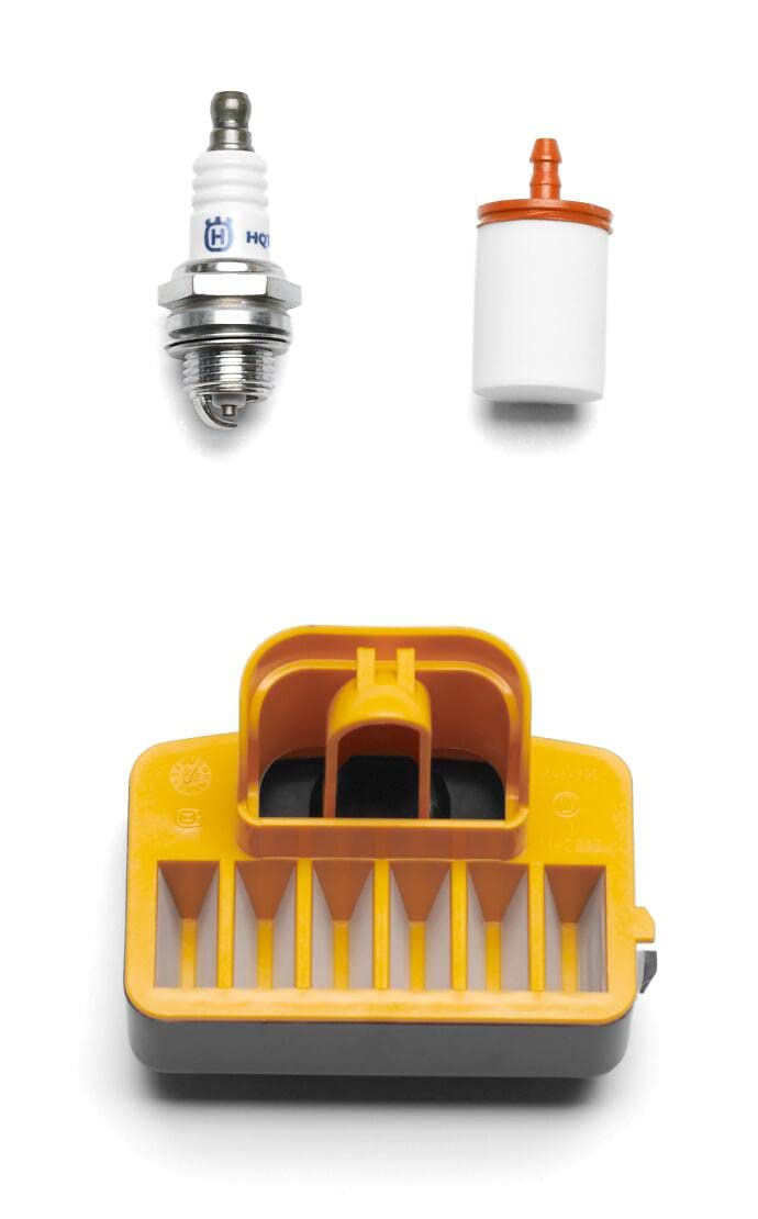 Husqvarna maintenance kit spark plug installed for reliable ignition and starts
