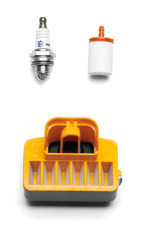 Husqvarna maintenance kit spark plug installed for reliable ignition and starts