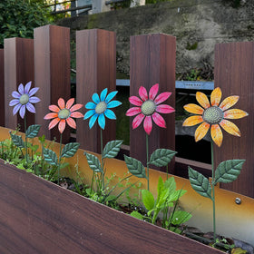HUTHDAK metal flowers outdoor 5-pack adds durable color to your garden borders.