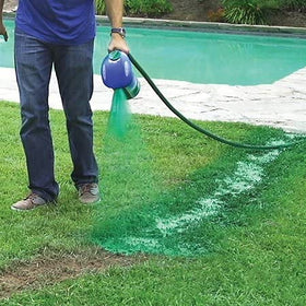 Hydro Mousse green mousse applied to soil shows precise seeding area.