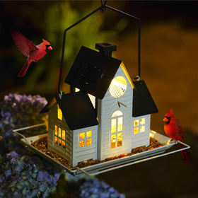 iemahor solar-powered-bird-feeder-lantern invites birds with warm night glow.