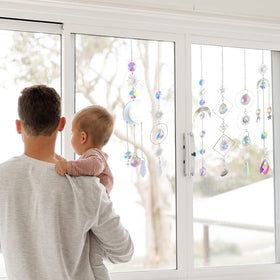 ilclviz crystal prism suncatcher chain reflects rainbow light in sunlight.