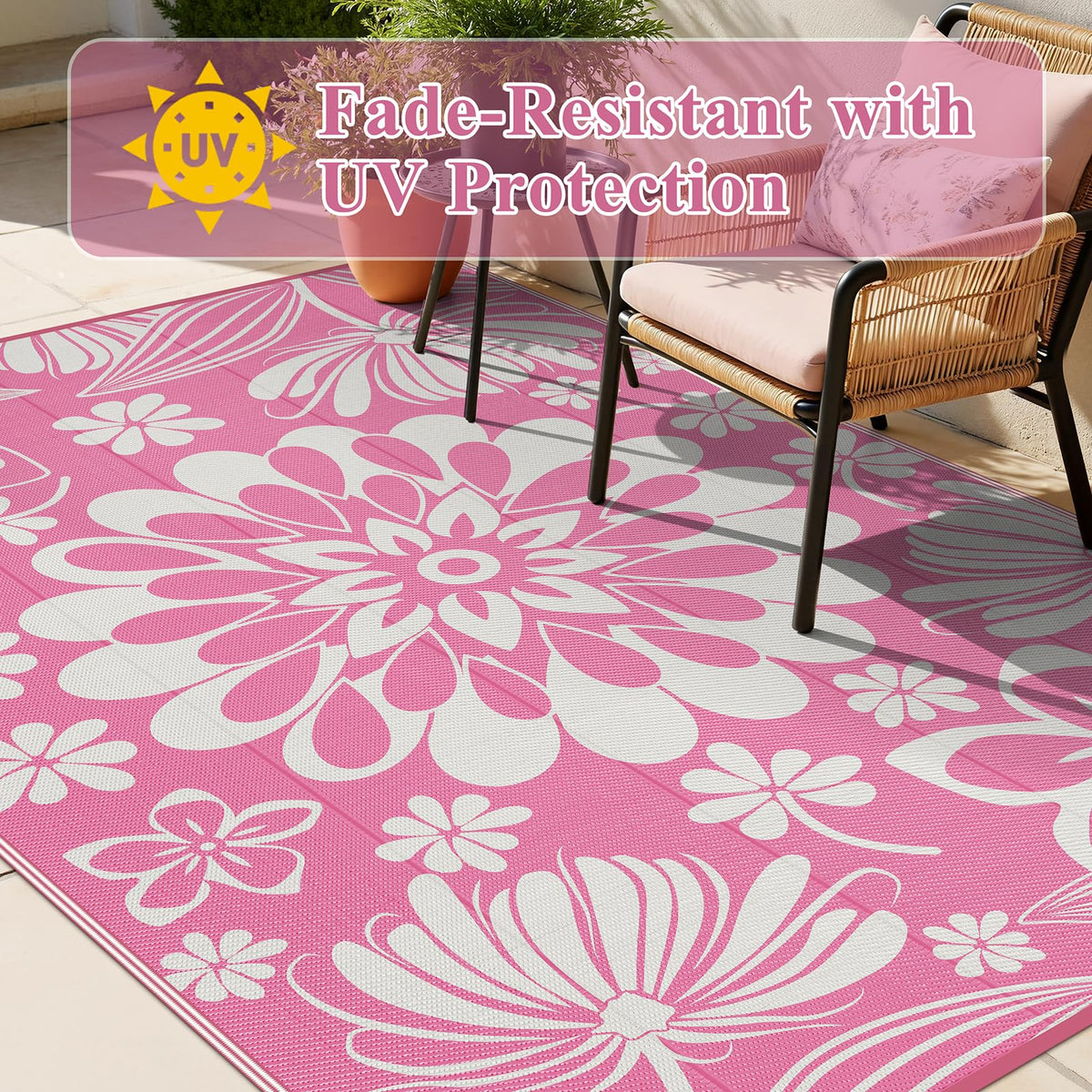 Ileading pink floral rug adds cheerful style to poolside areas.