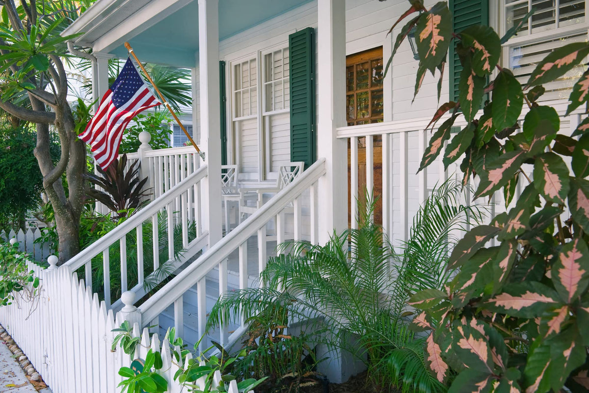 ILOT pack of two flag poles for symmetrical front-yard or entryway displays.