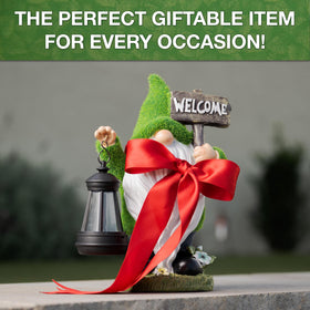 IMPECCABLE GOODS garden gnome lantern decor highlights flower beds after dusk.