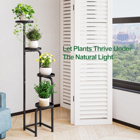INGIORDAR 4-Tier stand set up outdoors on a balcony or patio