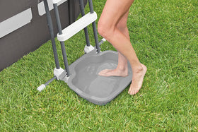 Intex 29080E foot bath gray in use demonstrates safe, splash-free rinsing on a ladder.