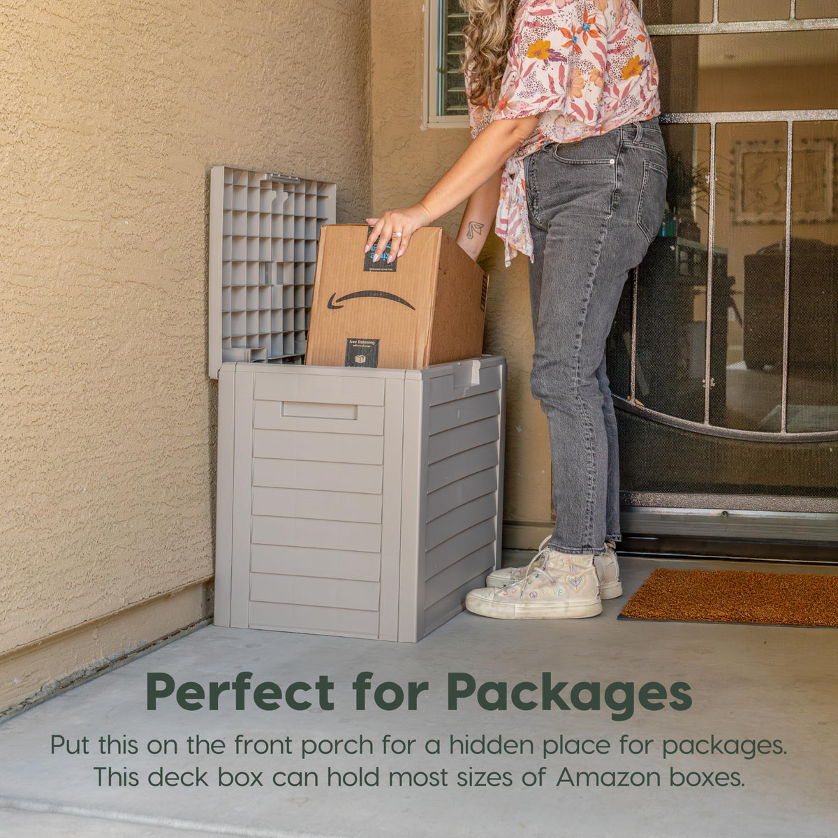 IRIS USA 35-Gallon outdoor deck box front-padlock-hole shows added security for deliveries