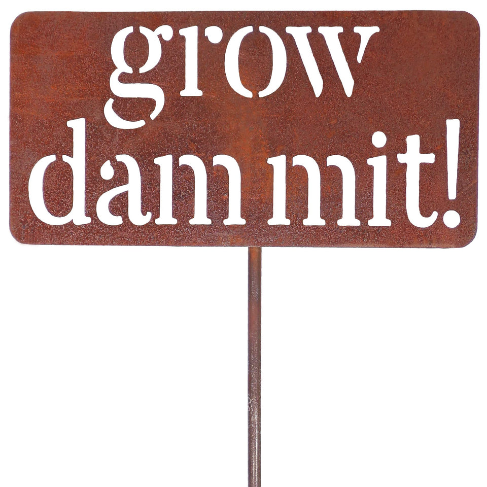Island Genius Grow Dammit sign in outdoor decor adds playful garden charm