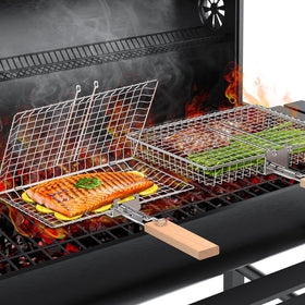 Ivtivfu fish grill basket with a removable wooden handle for even cooking outdoors.