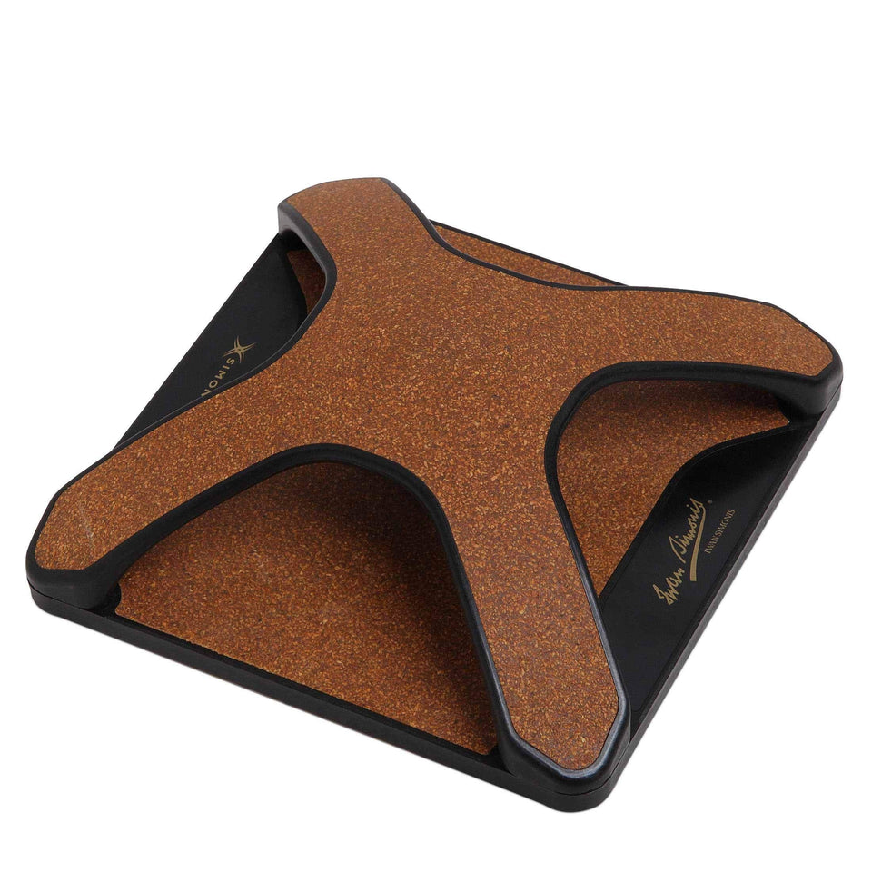 Iwan Simonis X-1 curved shape reaches under cushions for safe cloth cleaning.