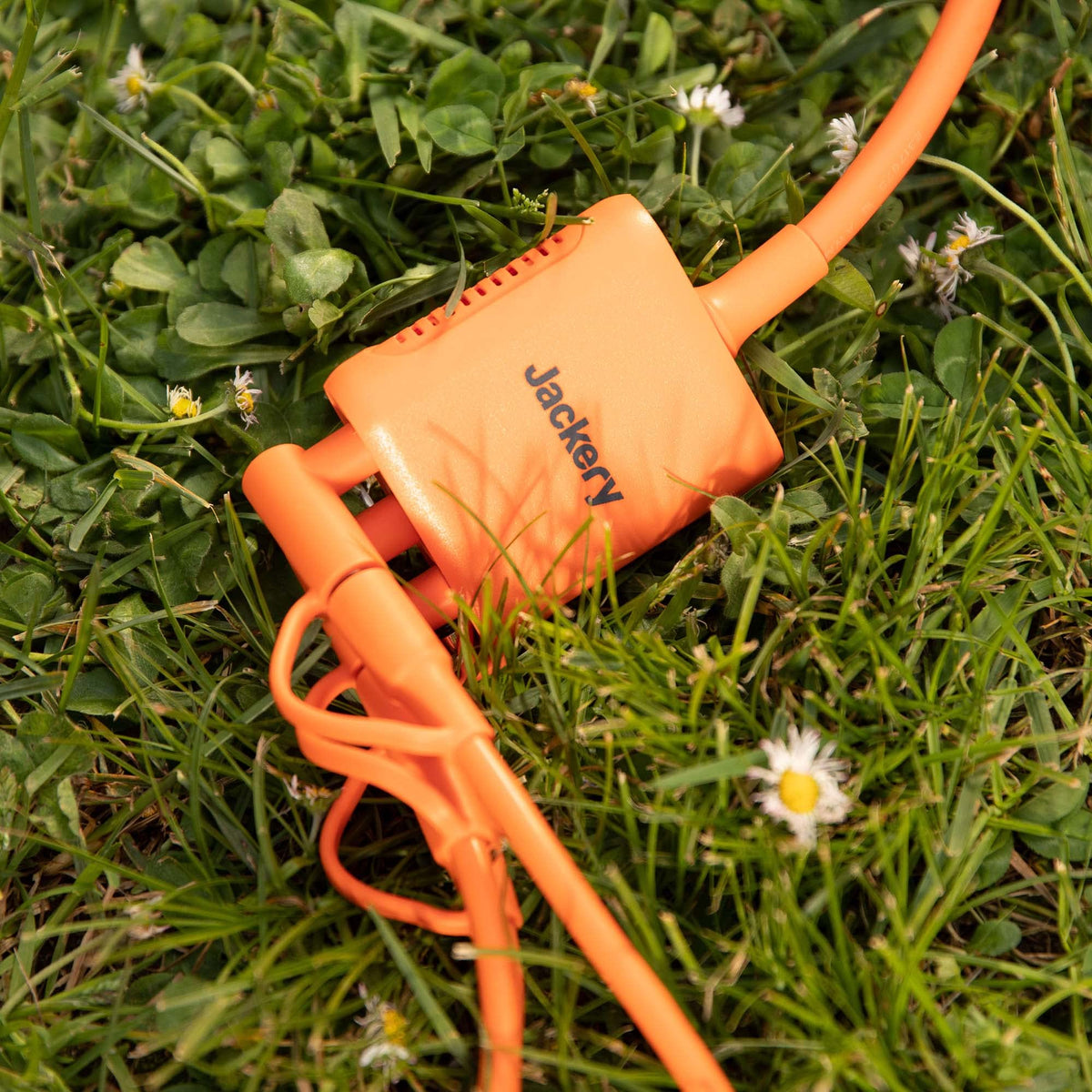 Jackery solar-series female connector with change-over cover for panel switching.