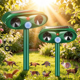 JahyElec solar animal repeller in yard deters wildlife with ultrasonic waves.