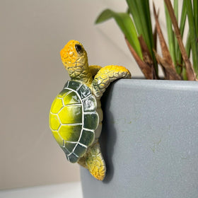 JARPSIRY climbing tortoise pot hugger decor elevates outdoor pots with whimsy