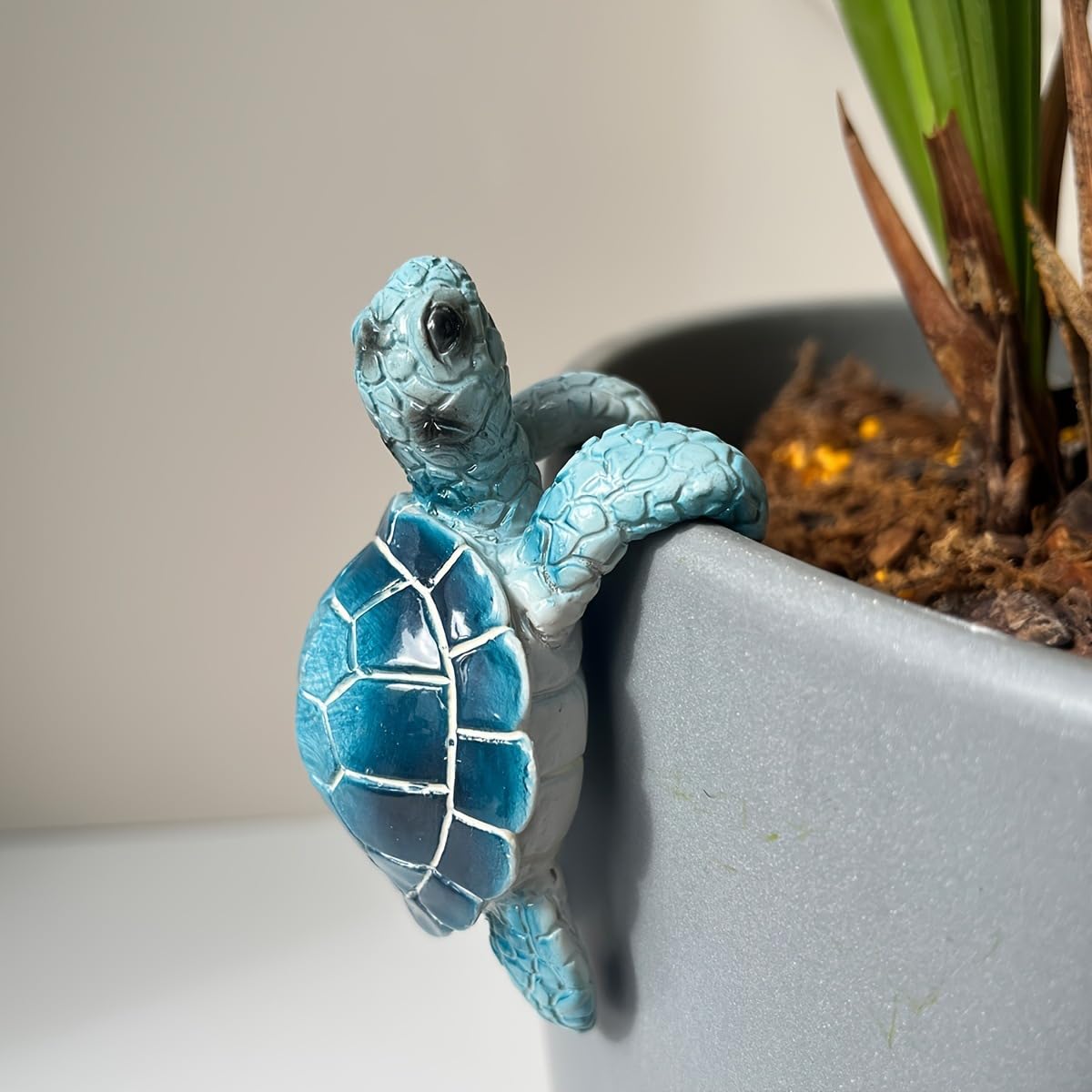 JARPSIRY cute climbing tortoise flower pot hugger enhances outdoor pots with charming whimsy
