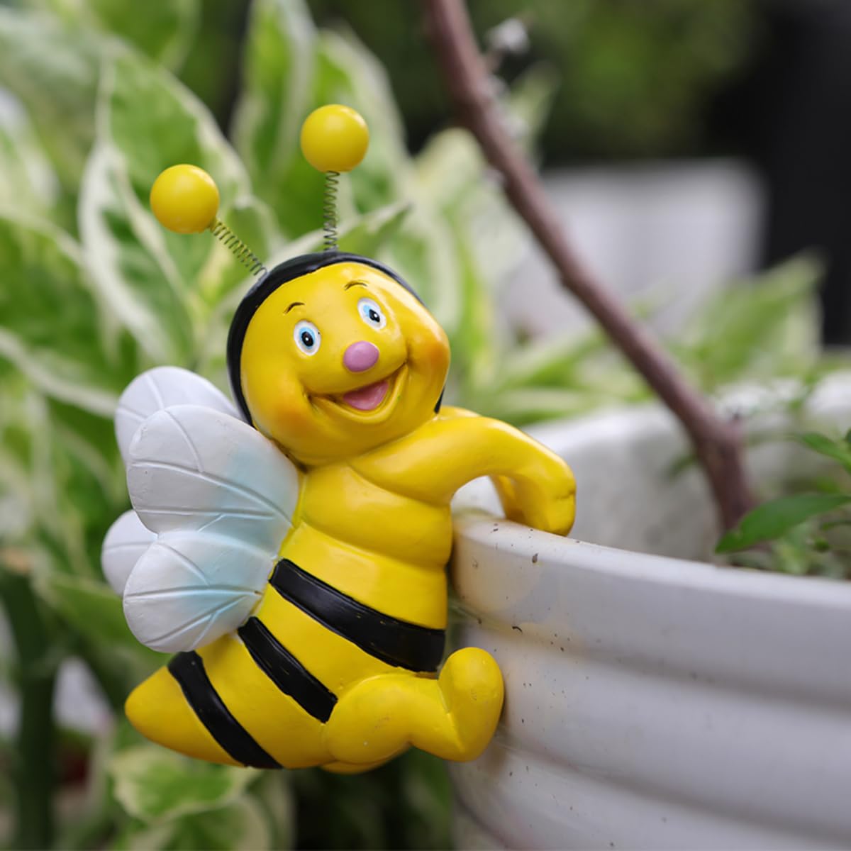 JARPSIRY resin bee statue with yellow and black stripes adds cheerful outdoor accents.