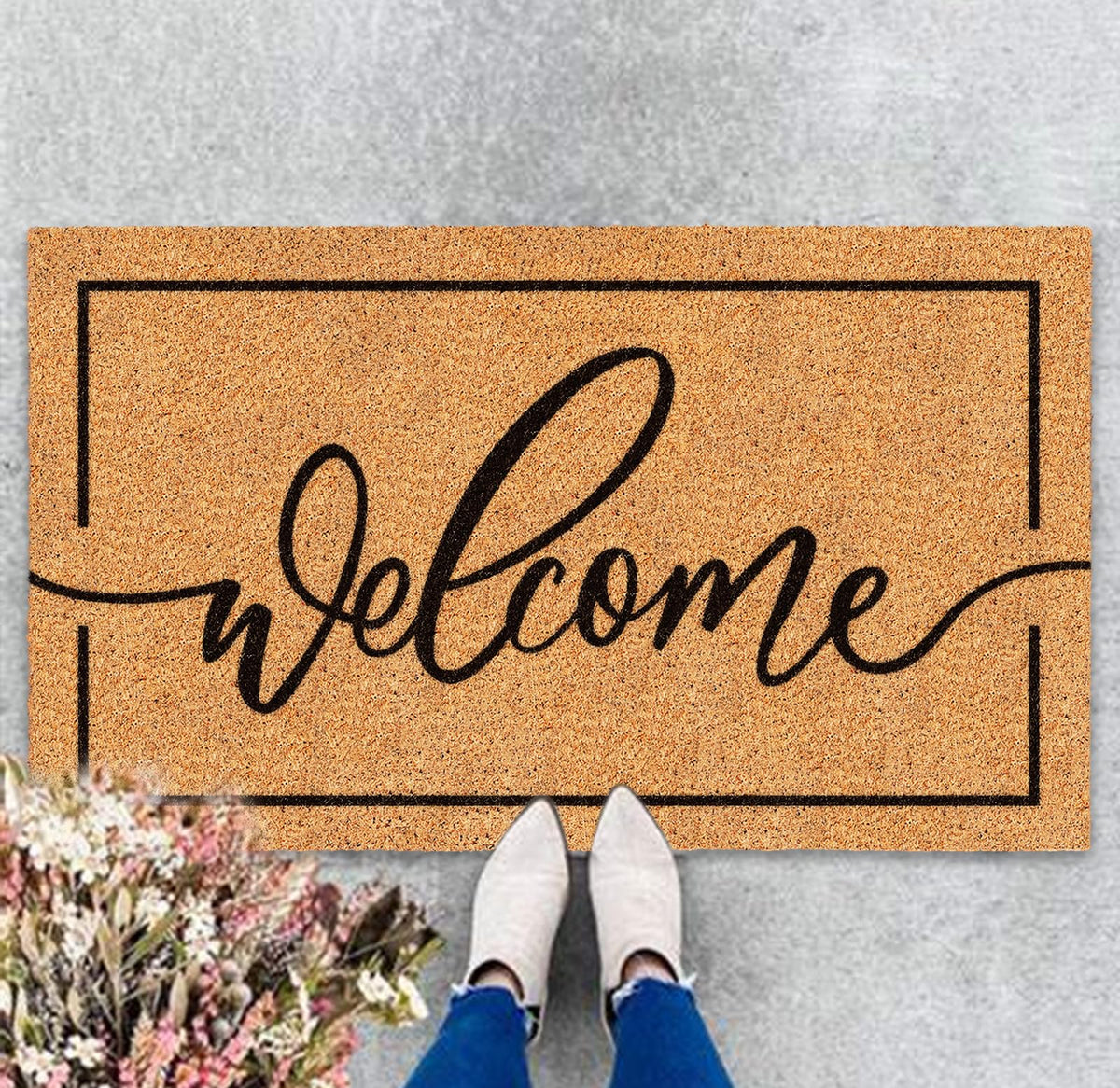 JarThenaAMCS Welcome Mat with natural coir border greets guests and traps dirt.